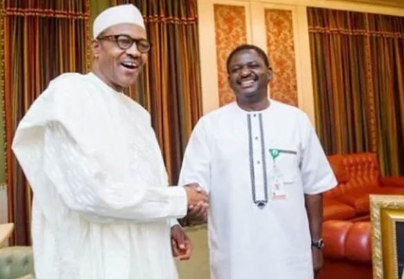 Muhammadu Buhari and Femi Adesina Svg%3E