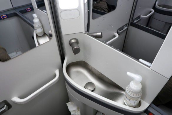 Toilet in American Airlines Svg%3E